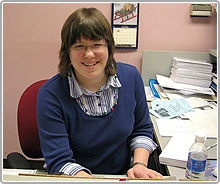 Photo of woman at desk